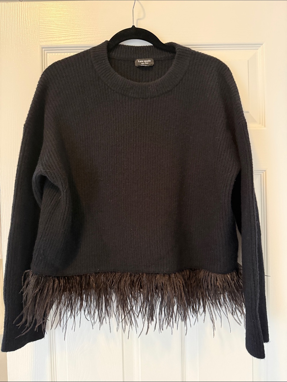 kate spade black crewneck sweater with feather hem